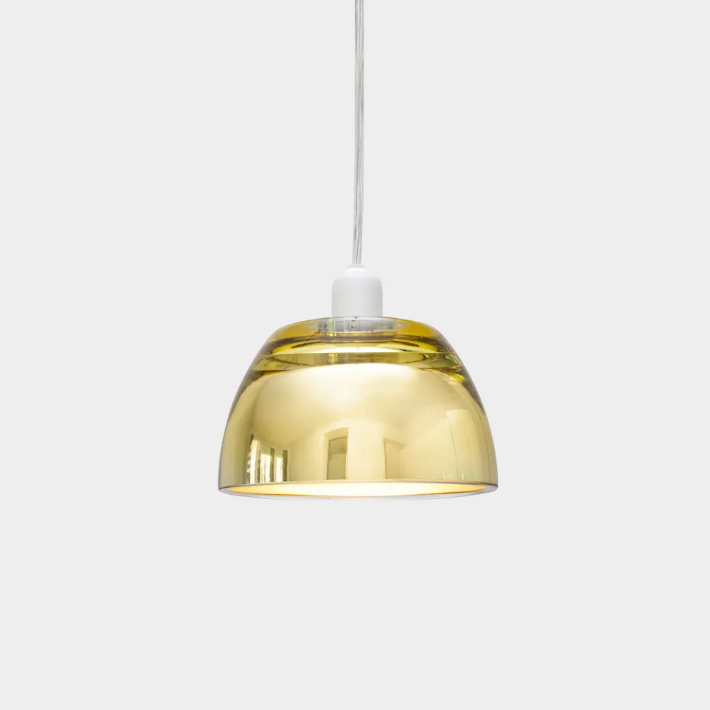 A brass toned glass pendant lamp